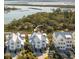 Aerial view of waterfront homes with marsh views at 9844 Haven Loop, Johns Island, SC 29455