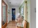 Bright entryway with wood floors and stylish seating at 9844 Haven Loop, Johns Island, SC 29455