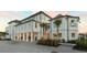 Luxury home with white siding, and palm trees at 9844 Haven Loop, Johns Island, SC 29455