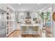 Modern kitchen with stainless steel appliances and white cabinetry at 9844 Haven Loop, Johns Island, SC 29455