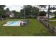 Inviting pool with deck and hot tub; great for entertaining at 106 Church St, Reevesville, SC 29471