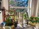 Farmhouse kitchen sink with plants and unique faucet at 106 Church St, Reevesville, SC 29471
