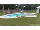 Relaxing pool with spa and deck, ideal for outdoor enjoyment at 106 Church St, Reevesville, SC 29471