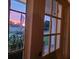 View of the front yard at sunset through the front door at 106 Church St, Reevesville, SC 29471
