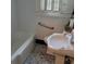 Updated bathroom with subway tile, pedestal sink, and clawfoot tub at 106 Church St, Reevesville, SC 29471