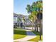 Residential street with houses and palm trees at 1691 Cultivation Lane Way # 462, Mount Pleasant, SC 29466
