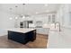 Modern kitchen with white cabinets, quartz countertops and farmhouse sink at 1691 Cultivation Lane Way # 462, Mount Pleasant, SC 29466