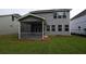 Two-story house with screened porch and backyard at 173 Cantona Dr, Summerville, SC 29483