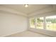 Well-lit bedroom with carpet and multiple windows at 173 Cantona Dr, Summerville, SC 29483