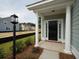 Inviting front entrance with columns and landscaping at 173 Cantona Dr, Summerville, SC 29483