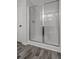 Modern shower with glass enclosure and grey vinyl flooring at 173 Cantona Dr, Summerville, SC 29483