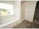 Bathroom with soaking tub, shower, and tile floor at 173 Cantona Dr, Summerville, SC 29483
