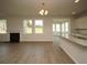 Bright dining room with hardwood floors and sunroom access at 173 Cantona Dr, Summerville, SC 29483