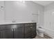 Clean bathroom with dark brown vanity, toilet and bathtub at 173 Cantona Dr, Summerville, SC 29483