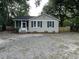 Newly renovated Ranch home with gravel driveway at 7629 Pinehurst St, North Charleston, SC 29420