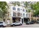 Three-story building on a tree-lined street at 106 Church St # D, Charleston, SC 29401