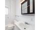Simple bathroom with white vanity, toilet, and subway tile at 106 Church St # D, Charleston, SC 29401