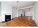 Spacious living room with hardwood floors, fireplace and chandelier at 106 Church St # D, Charleston, SC 29401