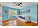 Bedroom with hardwood floors, ceiling fan, and built-in daybed at 148 Chadwick Dr, Charleston, SC 29407
