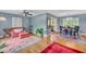 Open living room with hardwood floors and seating at 148 Chadwick Dr, Charleston, SC 29407