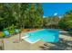 Refreshing in-ground pool, ample patio space, and a tranquil setting at 6008 Mansfield Blvd, North Charleston, SC 29418