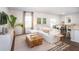 Open living space with a sectional sofa and large TV at 509 Frutchey Ct, Summerville, SC 29486