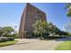 Brick building exterior with landscaping and parking at 14 Lockwood Dr # 10D, Charleston, SC 29401
