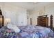 Charming bedroom with hardwood floors and a patchwork quilt at 14 Lockwood Dr # 10D, Charleston, SC 29401