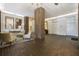 Elegant lobby with brick columns, seating area, and elevators at 14 Lockwood Dr # 10D, Charleston, SC 29401