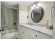 Bathroom with a shower/tub combo and white vanity at 14 Lockwood Dr # 10D, Charleston, SC 29401