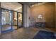 Building entryway with brick walls and seating area at 14 Lockwood Dr # 10D, Charleston, SC 29401