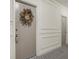 Building hallway with decorative wreath and keyless entry at 14 Lockwood Dr # 10D, Charleston, SC 29401