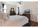 Bedroom with hardwood floors and antique furniture, featuring a TV at 14 Lockwood Dr # 10D, Charleston, SC 29401
