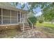Screened porch with brick steps and backyard view at 525 Parkdale Drive, Charleston, SC 29414