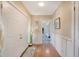 Spacious entryway with hardwood floors, white doors, and wainscoting at 525 Parkdale Drive, Charleston, SC 29414