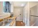 Kitchen with double sink, wood countertops and stainless steel appliances at 525 Parkdale Drive, Charleston, SC 29414