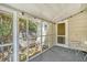 Cozy screened porch with outdoor furniture at 525 Parkdale Drive, Charleston, SC 29414