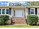 Double front doors with brick steps and landscaping at 525 Parkdale Drive, Charleston, SC 29414