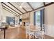 Open living area with vaulted ceiling, exposed beams, and brick fireplace at 525 Parkdale Drive, Charleston, SC 29414