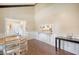 Dining area with wood table and pass-through to kitchen at 525 Parkdale Drive, Charleston, SC 29414