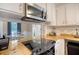 Modern kitchen with butcher block countertops and stainless steel appliances at 525 Parkdale Drive, Charleston, SC 29414