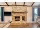 Large brick fireplace as a focal point in the living room at 525 Parkdale Drive, Charleston, SC 29414