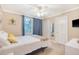 Well-lit bedroom with a full bed, ceiling fan, and closet at 525 Parkdale Drive, Charleston, SC 29414