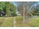 Ranch style home with a fenced yard and mature trees at 525 Parkdale Drive, Charleston, SC 29414