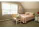 Charming bedroom with built-in shelving and a comfy bench at 309 Wintergreen Rd, Walterboro, SC 29488