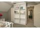 Charming bedroom with built-in shelves and access to another room at 309 Wintergreen Rd, Walterboro, SC 29488