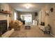 Bright living room with a cozy fireplace and comfortable seating at 309 Wintergreen Rd, Walterboro, SC 29488