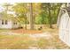 Backyard view with shed and wooden fence at 309 Wintergreen Rd, Walterboro, SC 29488