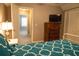 Bedroom with dresser, TV, and access to another room at 309 Wintergreen Rd, Walterboro, SC 29488