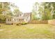 House backyard with deck and wooden fence at 309 Wintergreen Rd, Walterboro, SC 29488